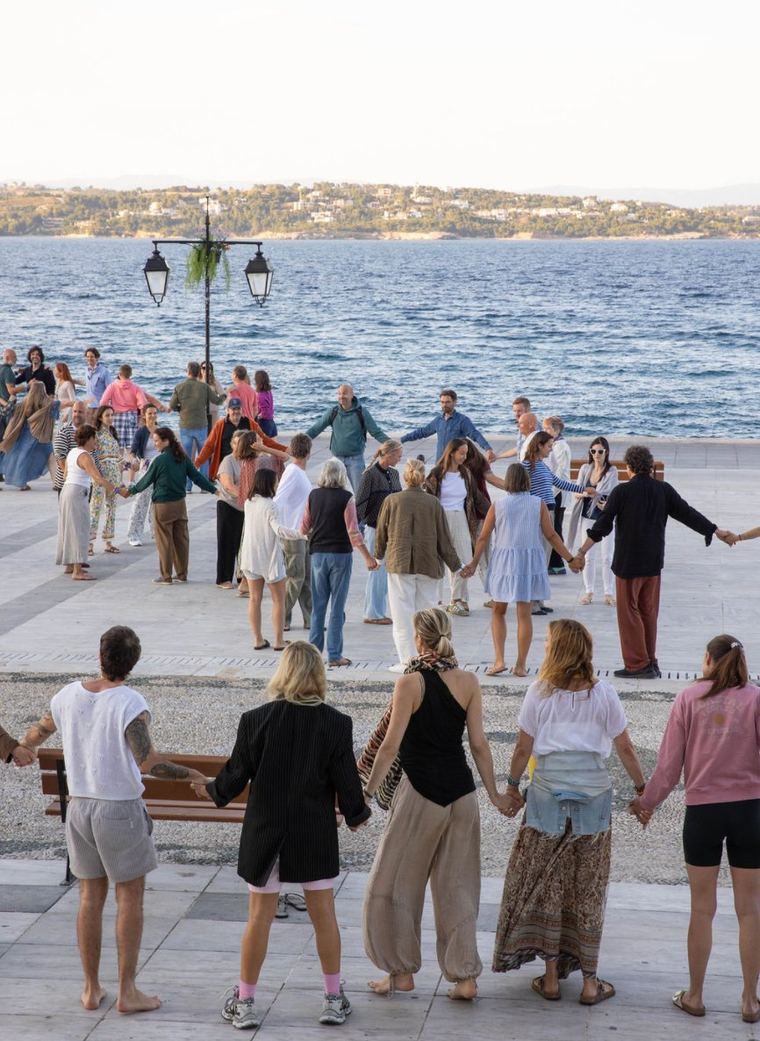 Holding the circle by the sea