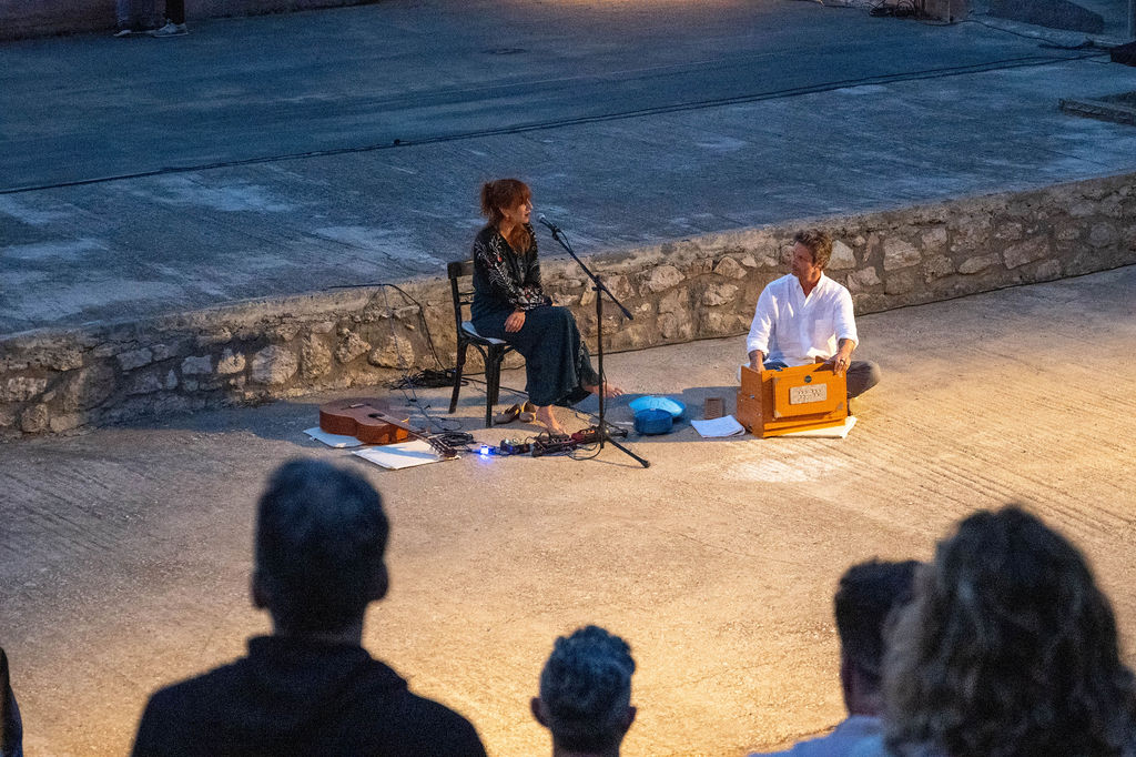 An evening performance in the Spetses amphitheatre — voice and harmonium under the open sky